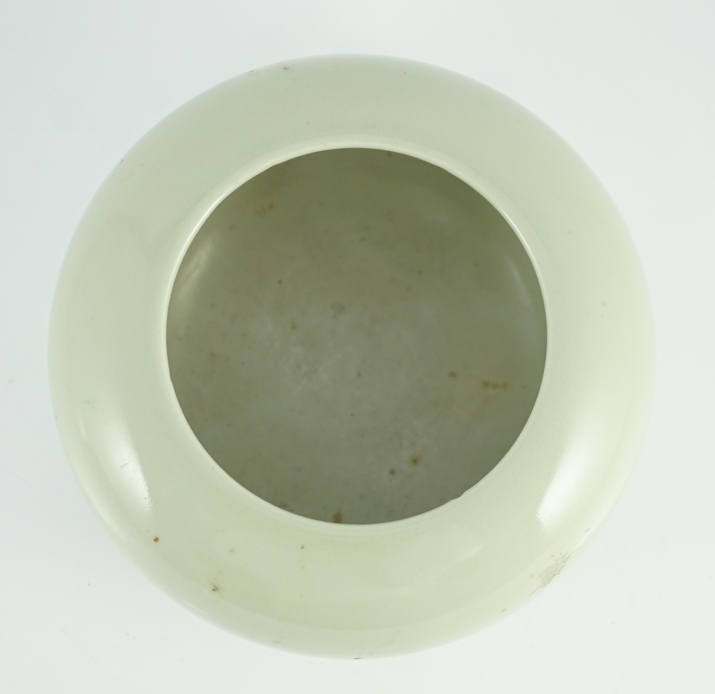 A Chinese celadon glazed water pot or alms bowl, late 19th century, 19cm diameter